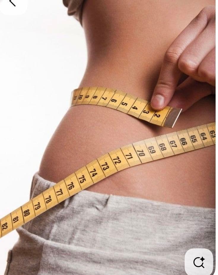 A woman who's showing positive results from Atelier Aesthetics weight loss program