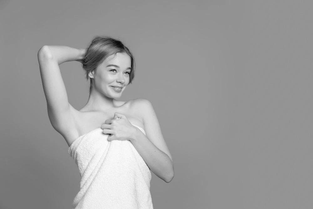 A woman with smooth, hair-free skin, showcasing the remarkable results of Aerolase® Neo laser hair removal.